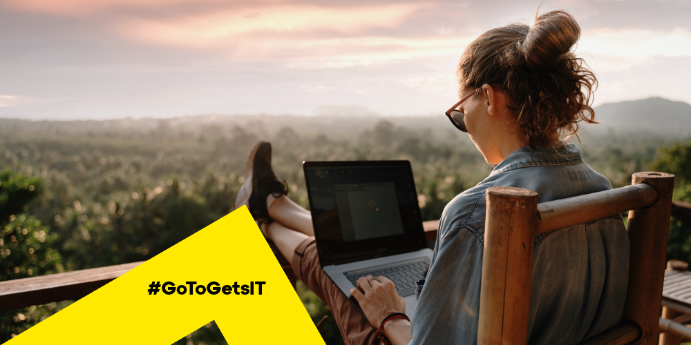 Woman working on a mountaintop overlook using network level authentication remote desktop