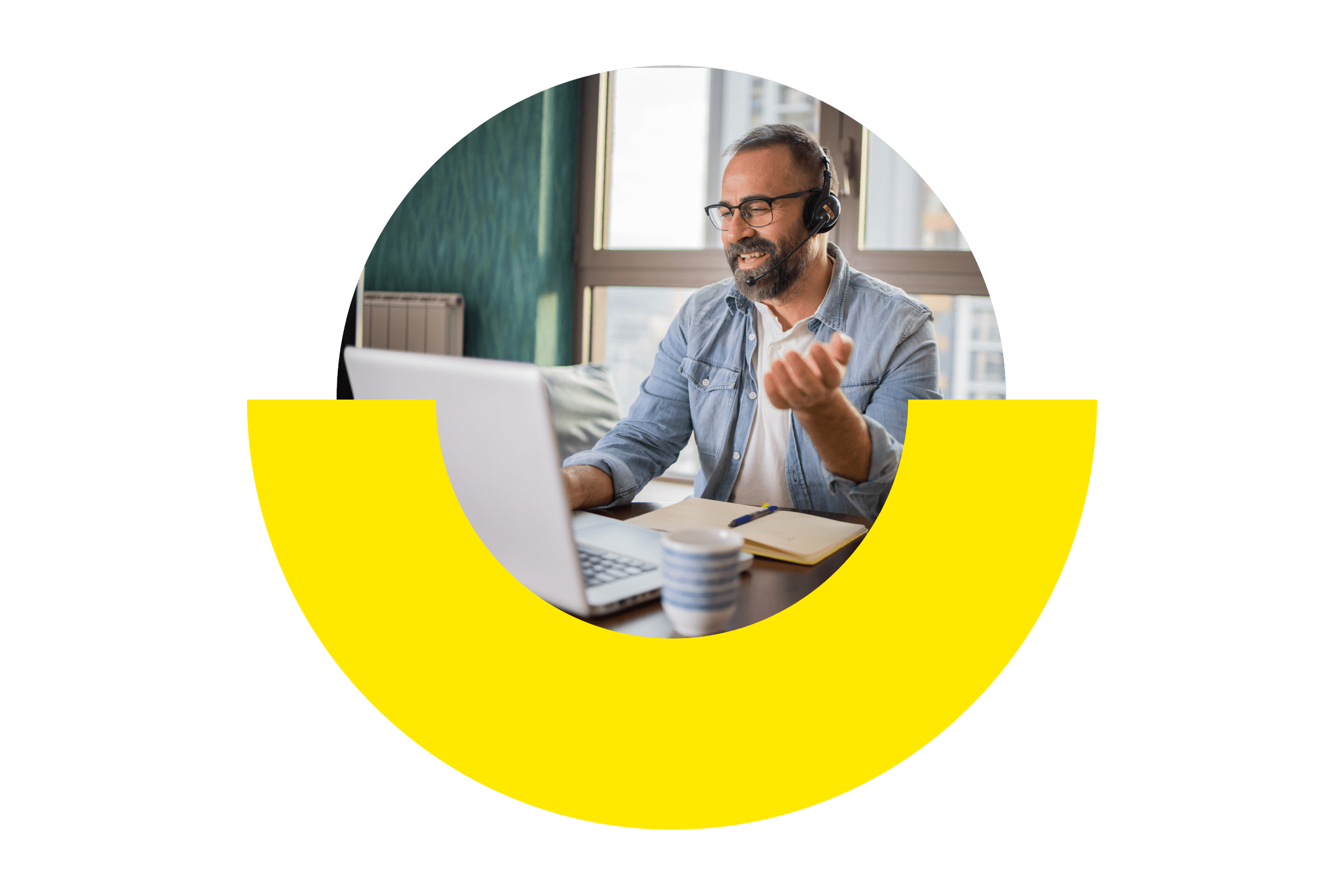 An IT representative wearing a headset, engaging with a customer during a business call.