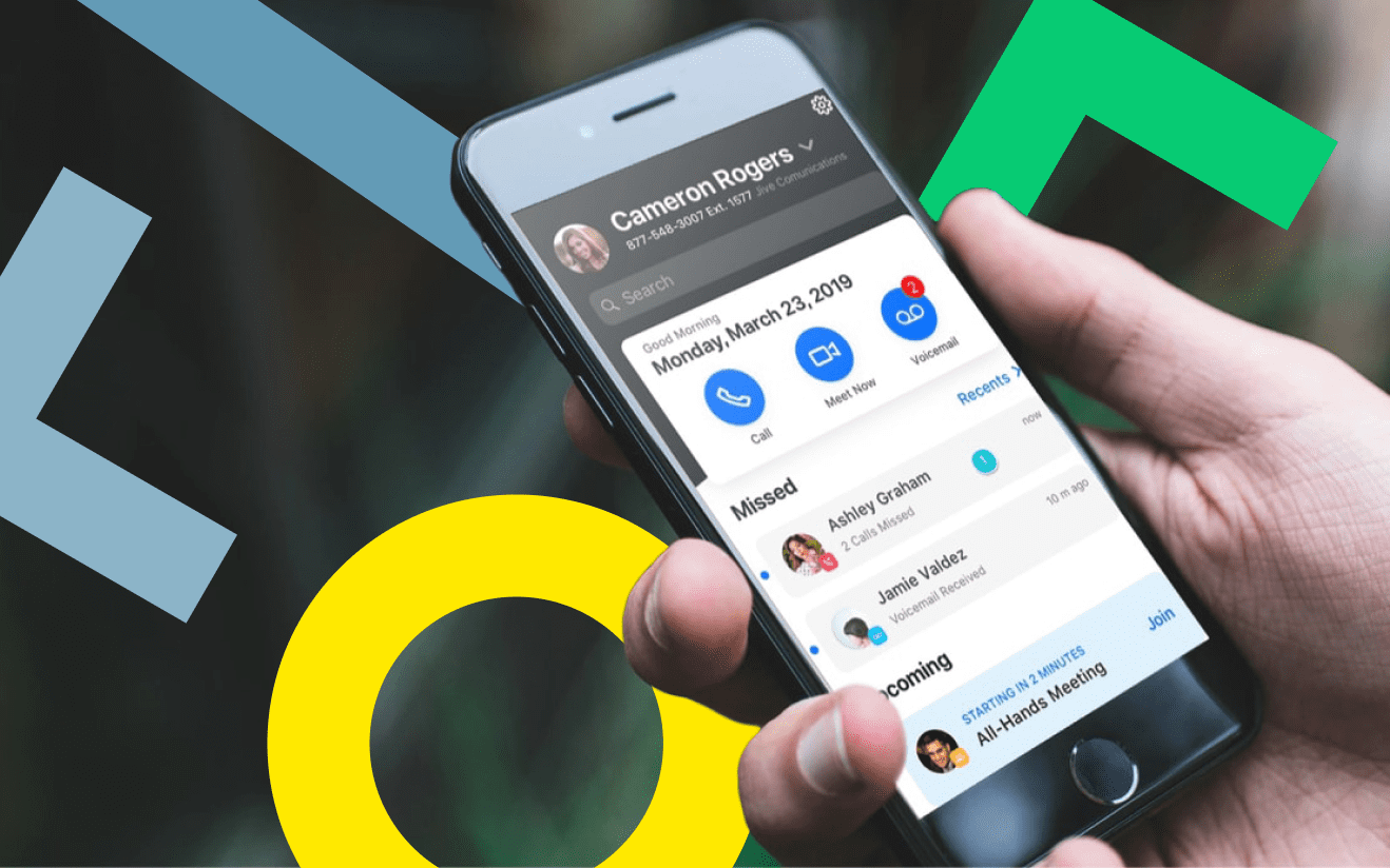 Hand holding a mobile phone with their GoToConnect dashboard.