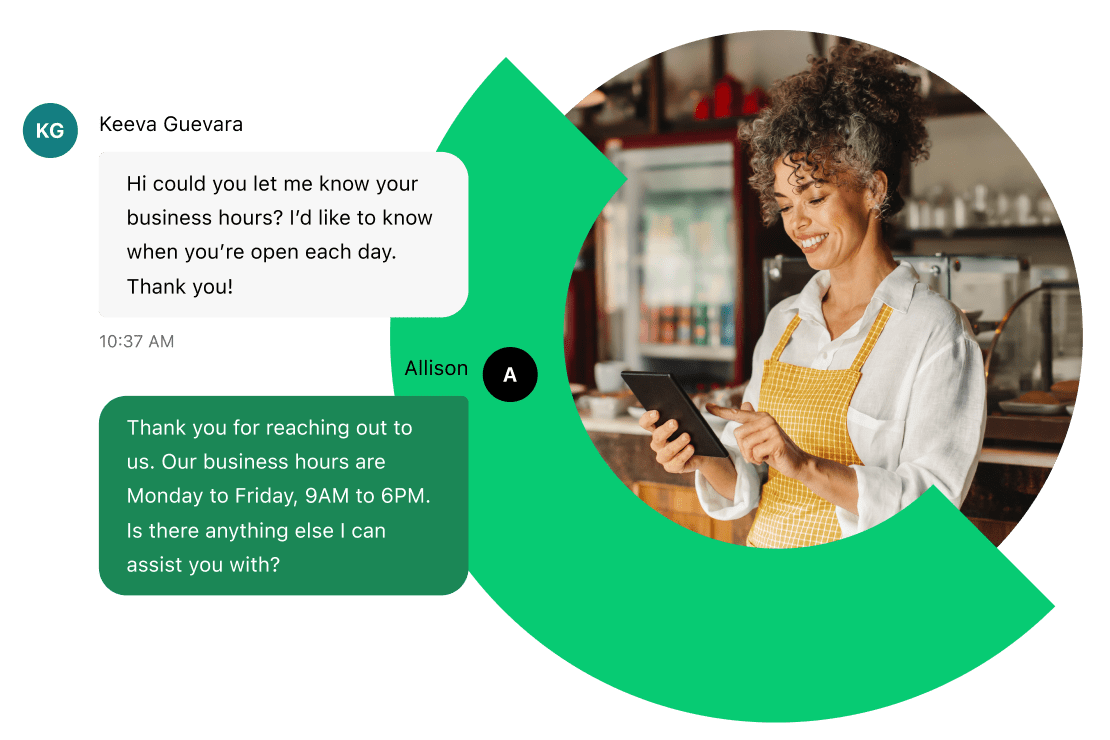 A cafe worker smiling while holding a tablet and using IVR software to interact with customers.