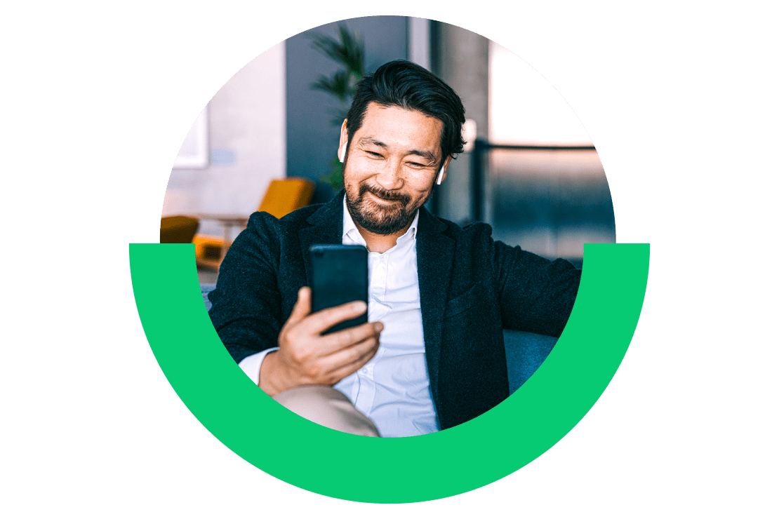 Man is engaging with a webinar on indsutry trends from the GoTo Webinar app.