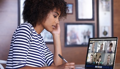 Remote employee video conferencing with coworkers from home