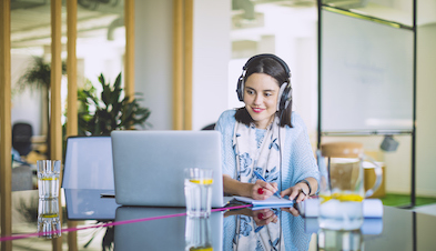 Worker with headset video conferencing with GoToConnect